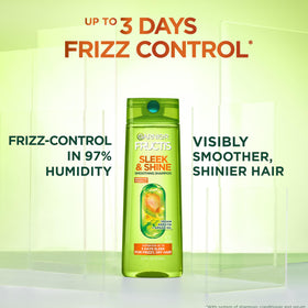 Garnier Fructis shampoo pouring to show smooth cleansing texture benefit