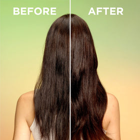 Garnier Fructis bottle next to a ruler to show 8.1 fl oz size and travel practicality benefit