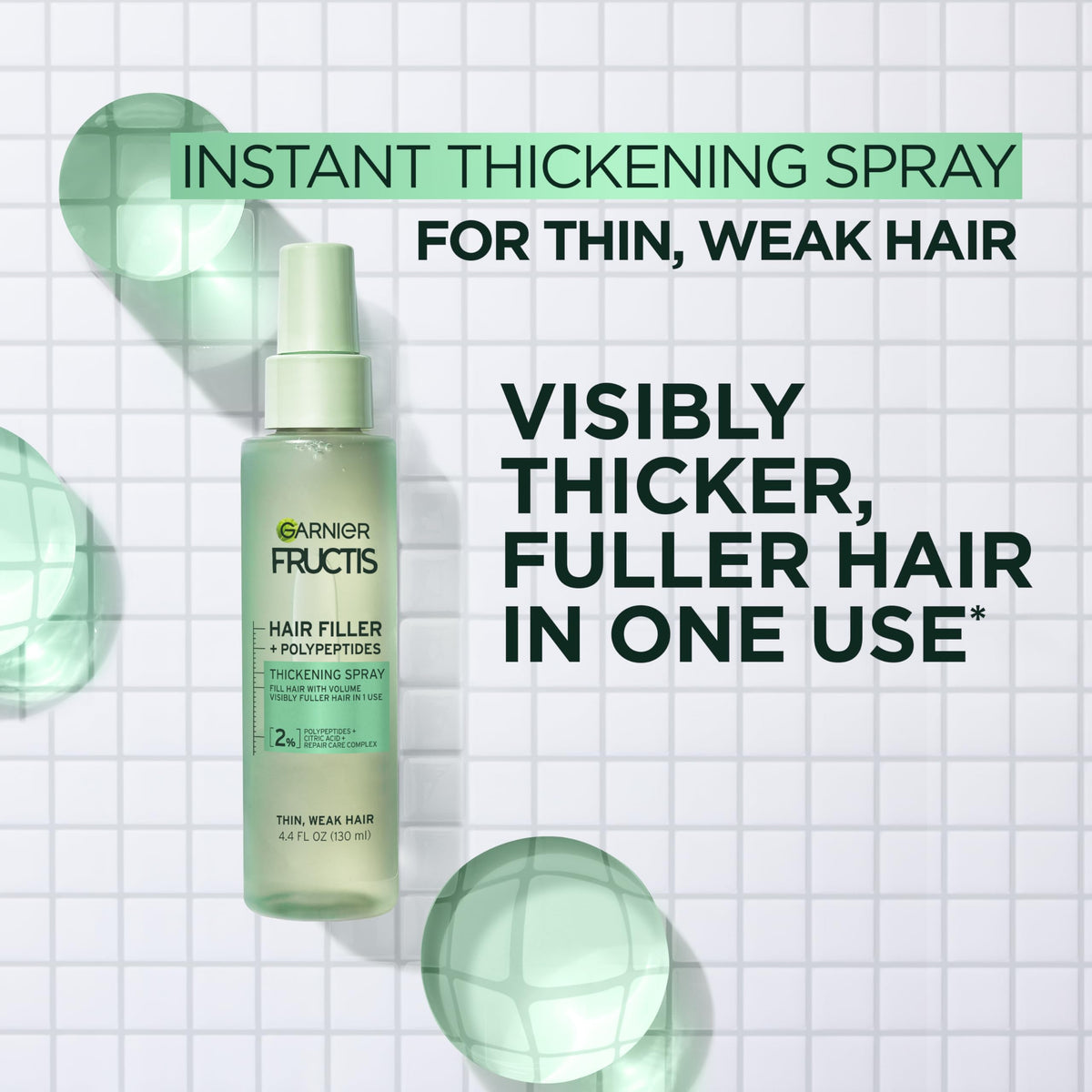 Garnier Fructis spray nozzle close-up for precise application benefit