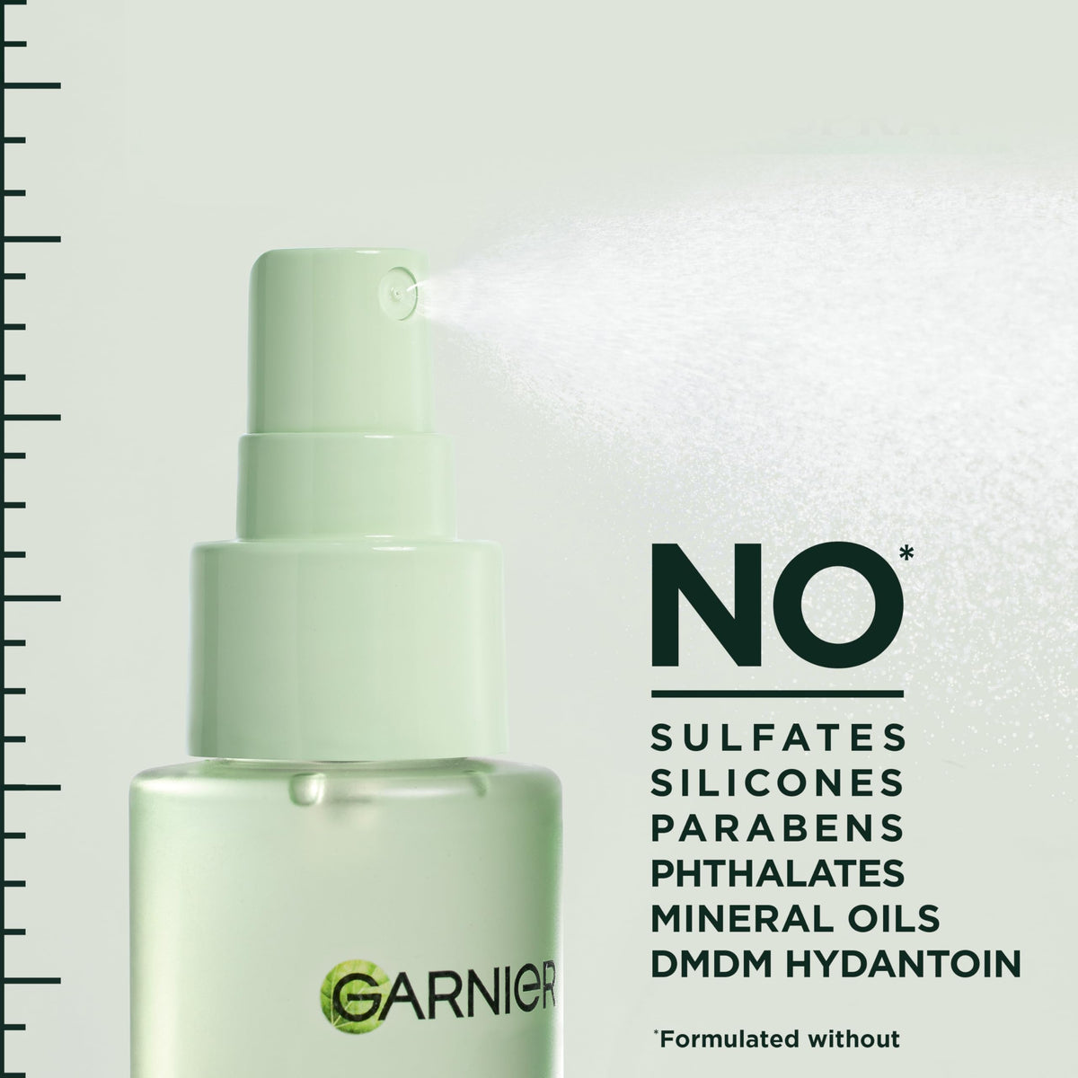 Garnier Fructis spraying into hair showing instant root lift benefit