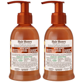 Garnier bottle on bathroom shelf with styling tools showing daily use