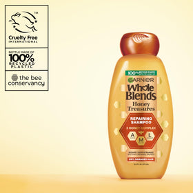Garnier model using shampoo in shower demonstrating gentle cleansing