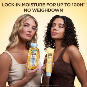 Natural honey nectar and floral water ingredients displayed with Garnier bottle, signaling nourishing botanicals