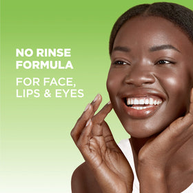 Cotton pad soaked with Garnier micellar water removing eye makeup with ease