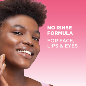 Garnier bottles in hand showing size comparison, convenient everyday carry benefit