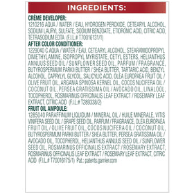 Garnier Nutrisse lifestyle model with vibrant auburn hair showcasing color payoff benefit