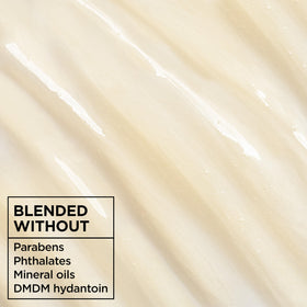 Garnier conditioner applied to hair ends to detangle and smooth