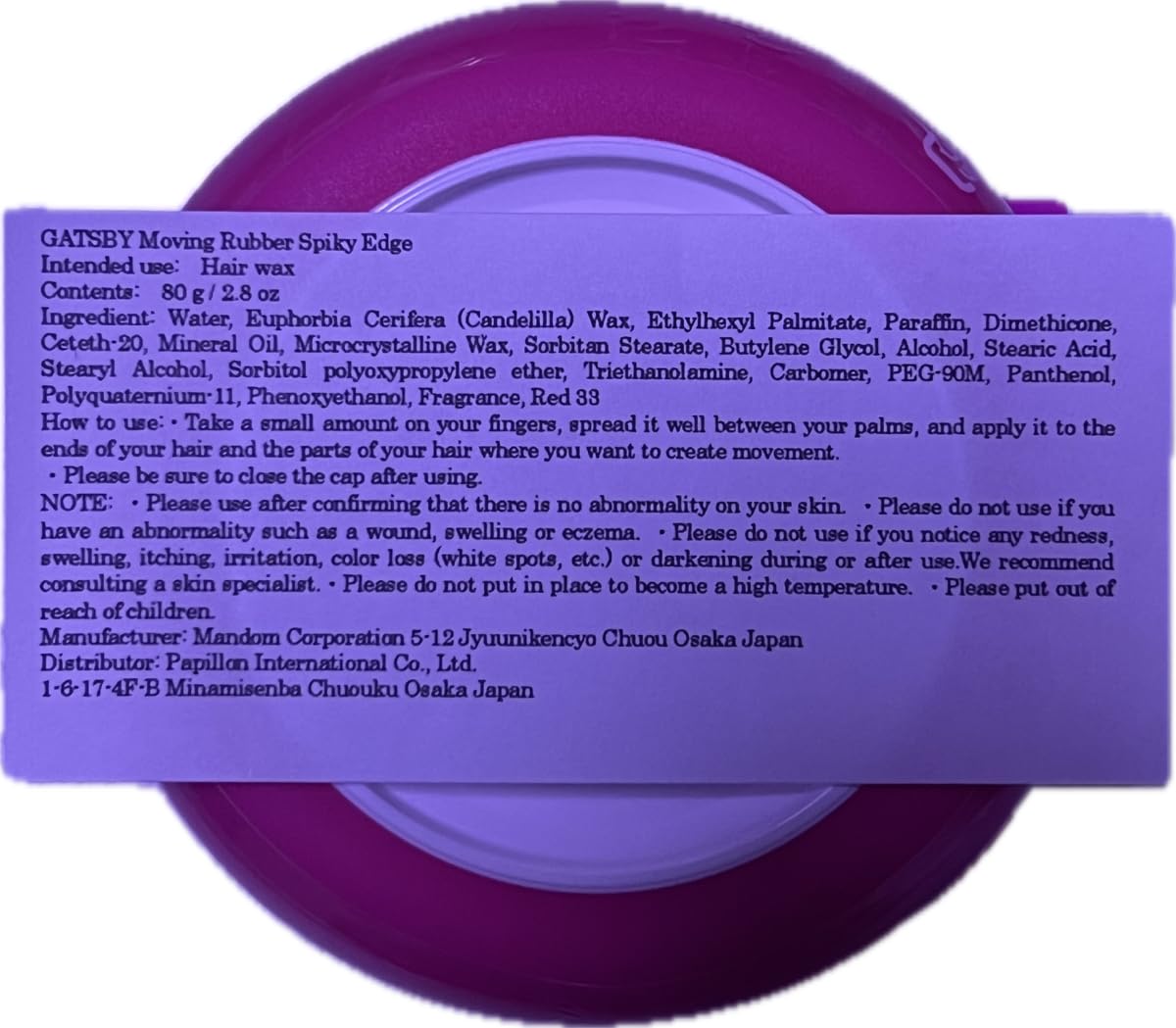 Gatsby product label close-up listing ingredients and paraben-free benefit