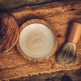 G.B.S soap bar in hand showing travel-friendly size and convenient portability