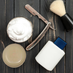 G.B.S soap tucked inside a dopp kit showing travel convenience and grooming-ready portability