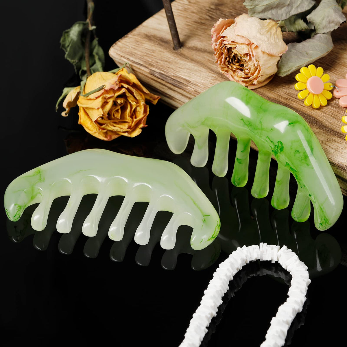 Geiserailie comb used on scalp demonstrating tension-relief massage benefit