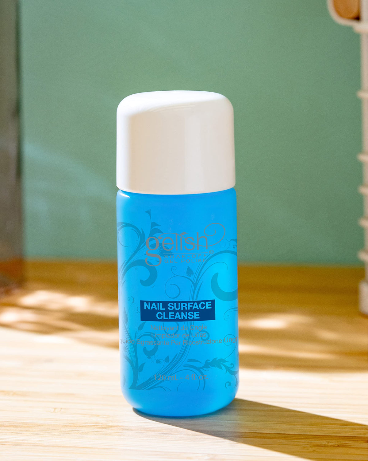 Gelish in-use wipe removing tacky residue to reveal a glossy, salon-quality finish