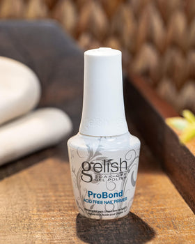 Gelish ProBond brush detail applying a thin coat demonstrating controlled, even coverage