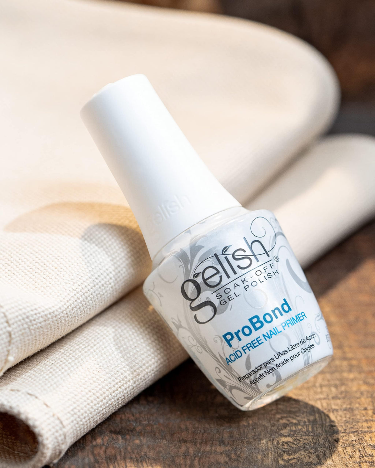 Gelish ProBond in salon use with technician applying product for longer-lasting nails