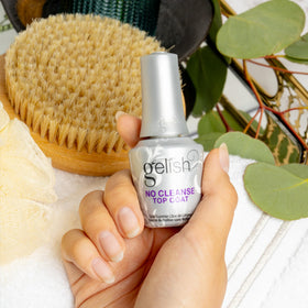 Gelish top coat curing under LED lamp for quick, durable seal