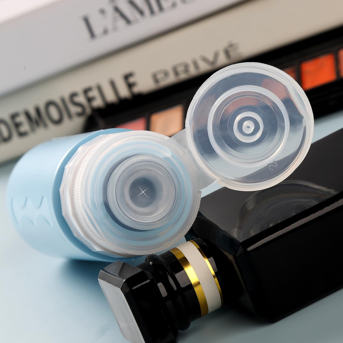 Gemice closeup of no‑drip valve demonstrating spill protection and precise dispensing