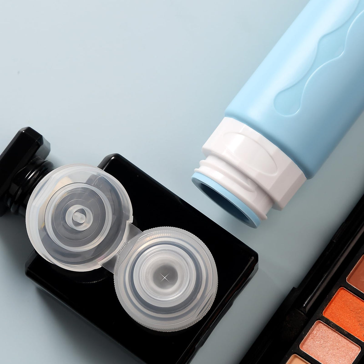 Gemice travel pouch being placed in suitcase demonstrating tidy organization benefit
