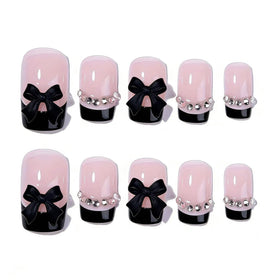 Generic close-up of bow rhinestone detail highlighting decorative sparkle for standout manicures