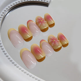 Generic close-up of 3D floral detail and French tip highlighting delicate texture