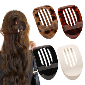 Generic front view of four duckbill hair clips showing colors and shape, useful for styling