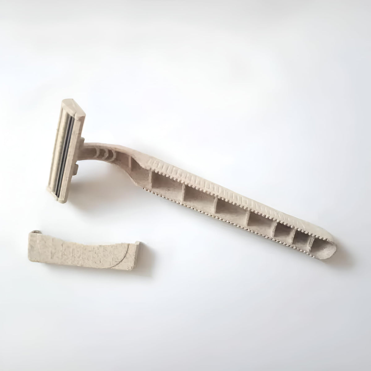 Generic razor held in hand demonstrating size and comfortable handling