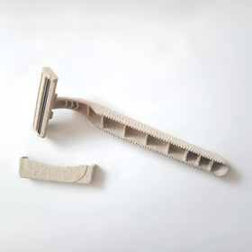 Generic razor held in hand demonstrating size and comfortable handling