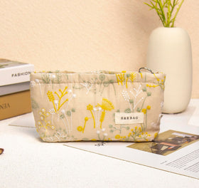 getgto lifestyle shot with pouches beside a suitcase showing packing convenience benefit
