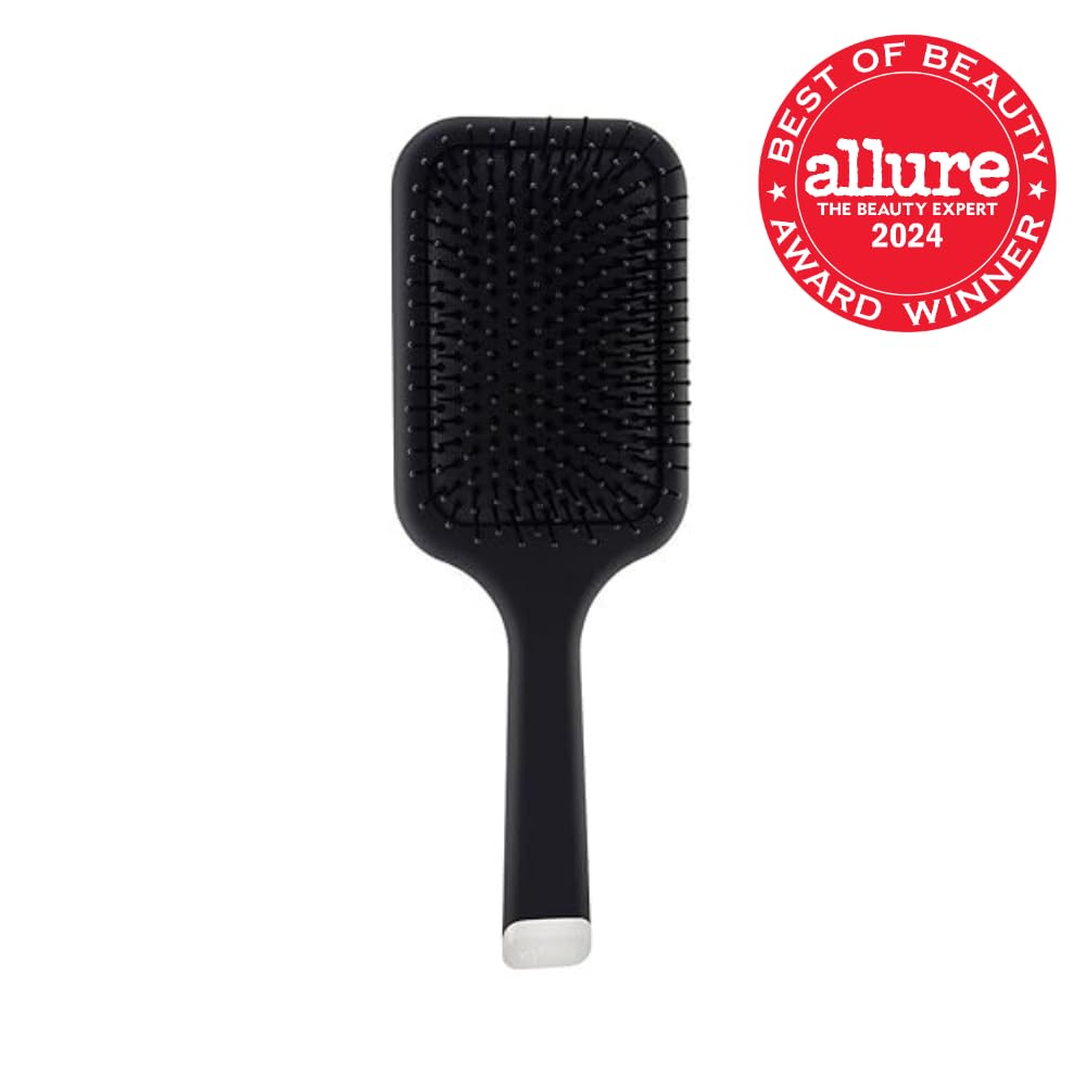 ghd paddle brush in use with hair dryer for sleek blow-dry results