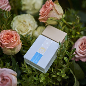 DUCCI closeup atomizer of Bianco Latte revealing spray detail and even fragrance distribution