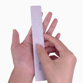 GigaGround file being rinsed to show washable, reusable durability