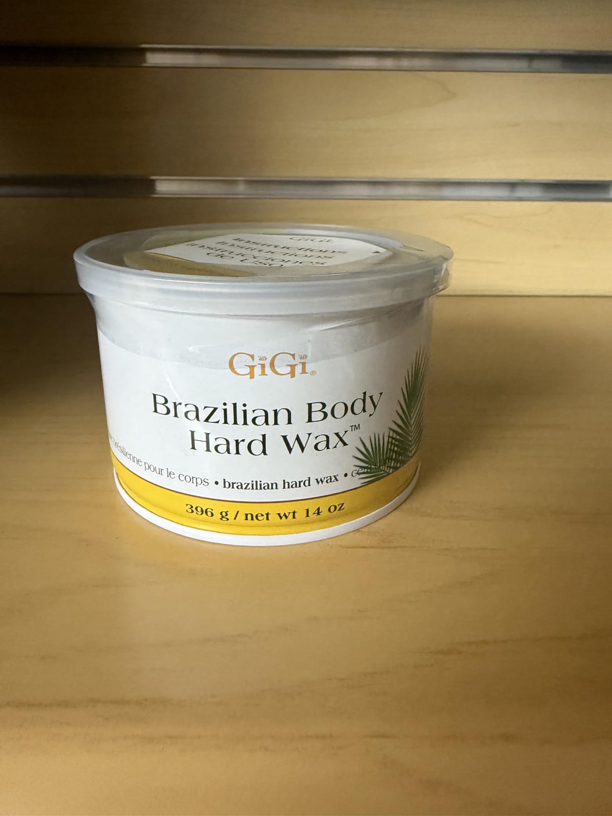 GIGI jar beside ruler showing 14 oz scale and value per jar