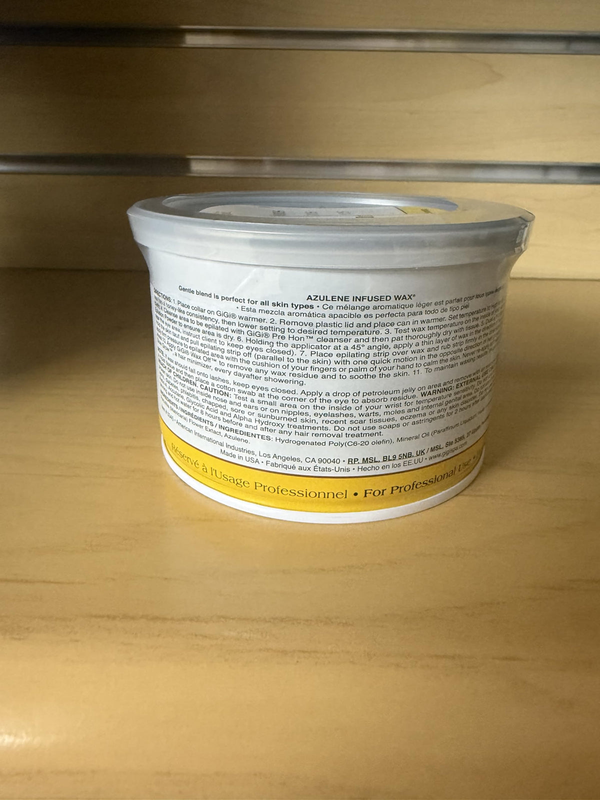 GIGI tub next to a hand for scale showing 13 oz size for economical multiple uses