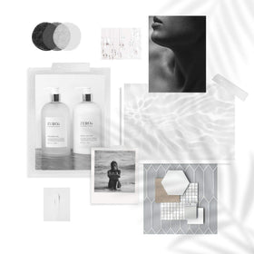 Gilchrist & Soames shampoo on shower shelf showing professional hospitality presentation