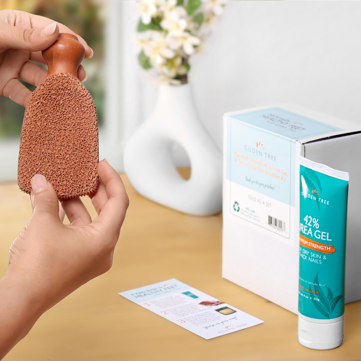 GILDEN TREE pumice held in hand showing size and ergonomic grip benefit