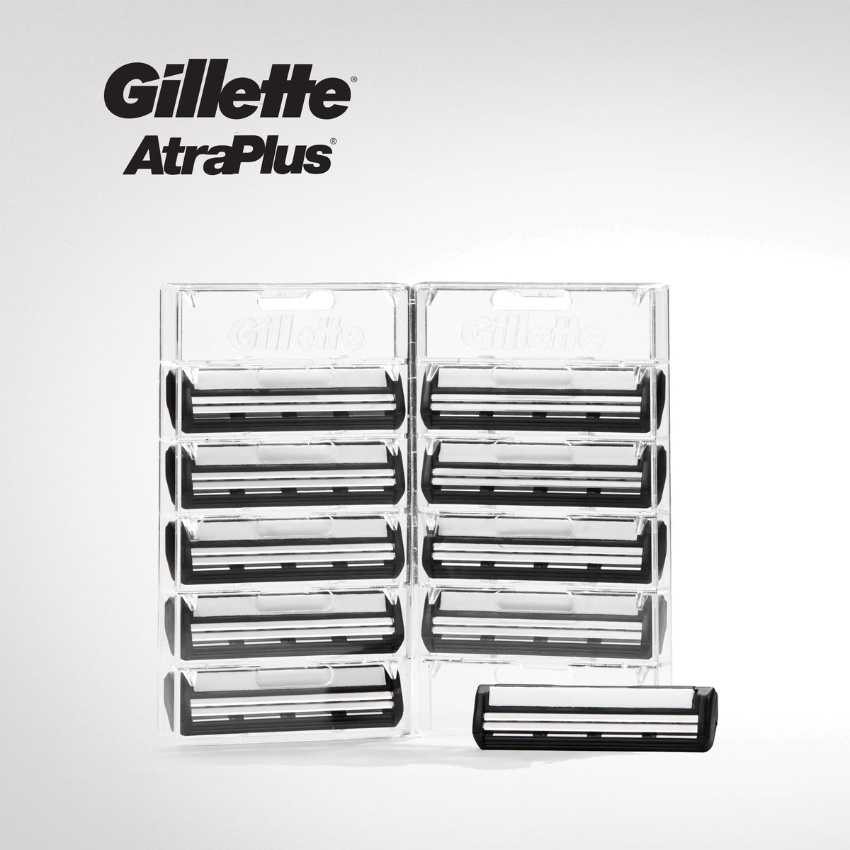Gillette cartridge next to coin showing compact size and portability