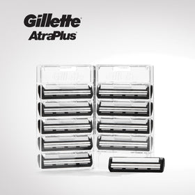 Gillette cartridge next to coin showing compact size and portability