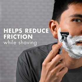 Man shaving with Gillette Foamy illustrating smooth razor glide benefit