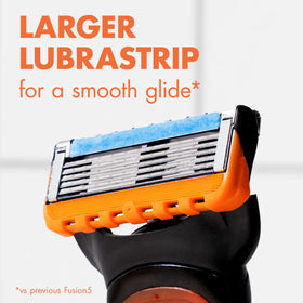 Gillette Fusion5 cartridge in use on a face demonstrating smooth wet shave