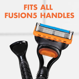 Gillette Fusion5 cartridge beside a Gillette 5-blade handle showing fit and scale