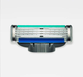 Close-up of Gillette Mach 3 blades and lubricating strip highlighting smooth glide and comfort