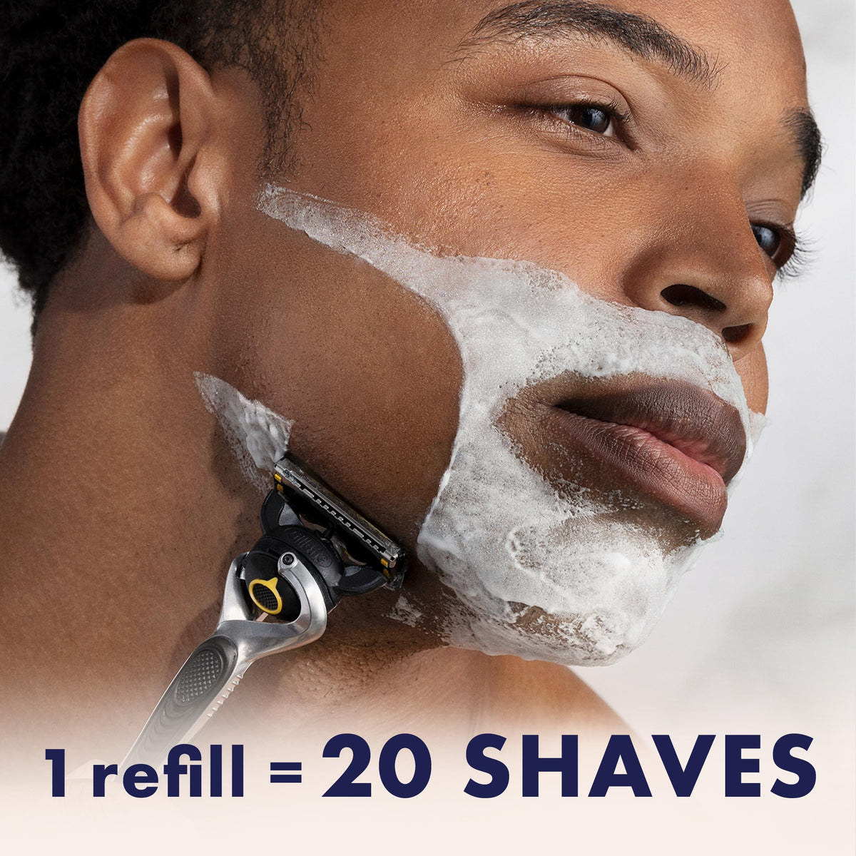 Gillette ProGlide razor in hand shaving demonstrating control and precise trimming
