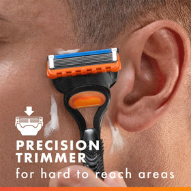 Gillette refills next to ruler showing one-month-per-refill expected duration