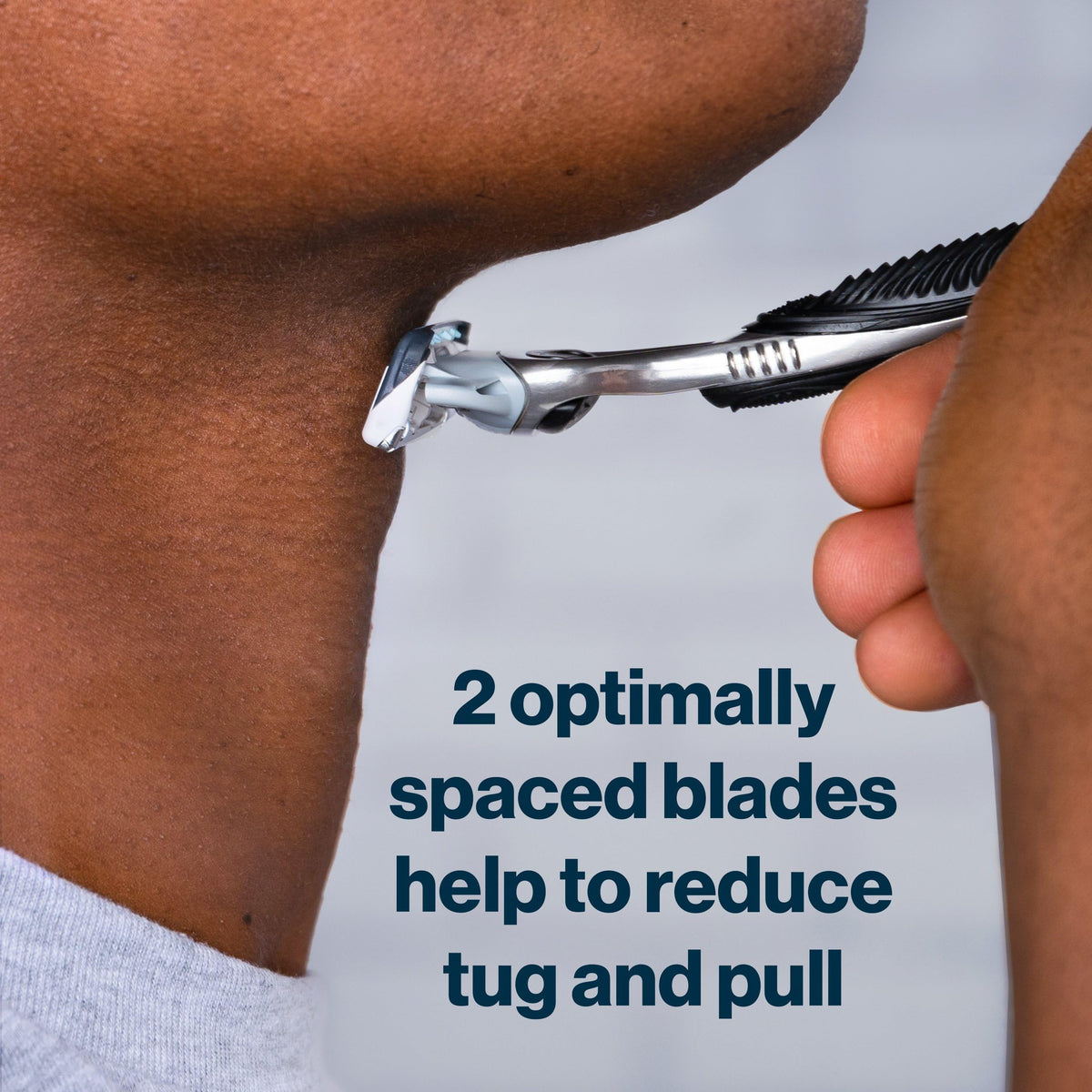 Gillette SkinGuard cartridge clipped into handle demonstrating secure fit and alignment