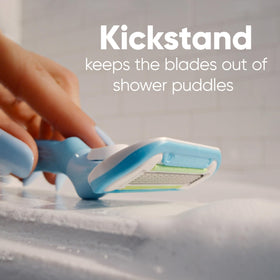 Textured Gillette Venus handle displaying non-slip surface for steady, precise strokes in wet conditions