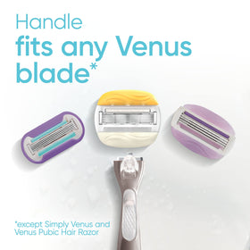 Gillette Venus refills on bathroom shelf conveying a moisturized routine