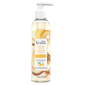 Gillette Venus bottle beside razor and cream showing routine compatibility