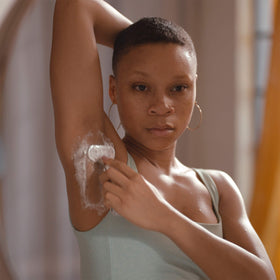 Shea butter and sea salt ingredients next to Gillette Venus can illustrating moisturizing, mineral-rich blend