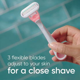 Gillette Venus razor head close-up showing three blades for a smooth shave