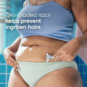 Gillette Venus razor held by hand demonstrating safe wet use
