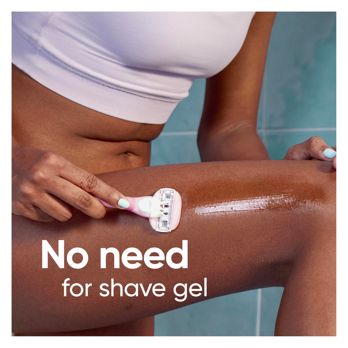 Gillette Venus razor in hand demonstrating ergonomic wet use benefit
